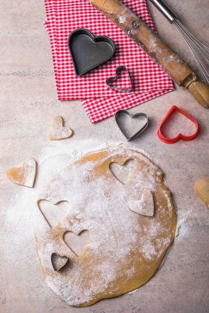 istock Valentine day baking background. Ingredients for cooking Valentine's heart.  Top view copy space. 1294192495