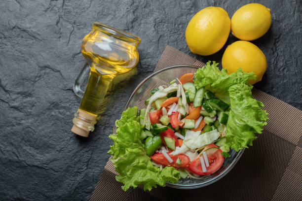 istock Homemade mixed salad on table for lunch, dinner or small party. 1294192519