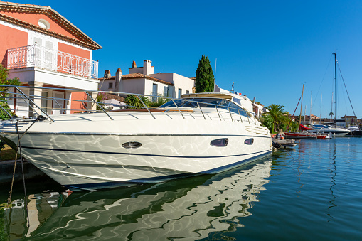 Travel and summer vacation destination, view on houses, roofs, canals and boats in Port Grimaud, Var, Provence, French Riviera, France