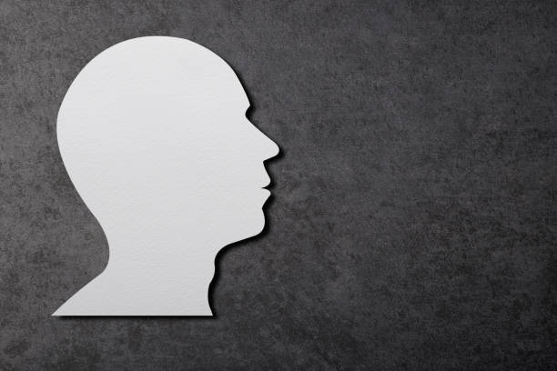 istock Paper Cut Human Head Shape With Clipping path 1294195385