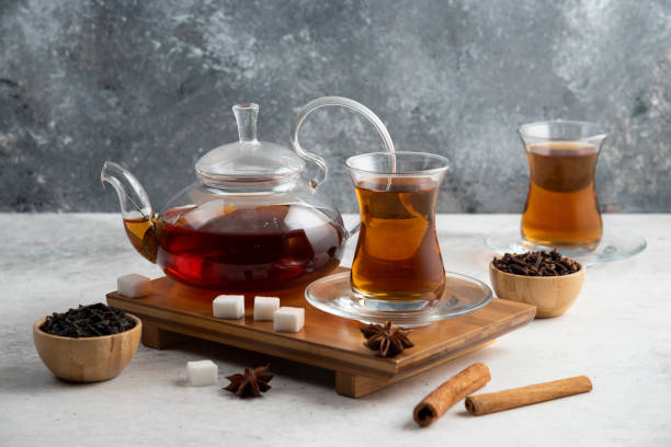 istock Two glasses cup of tea with sugar and star anise 1294197385