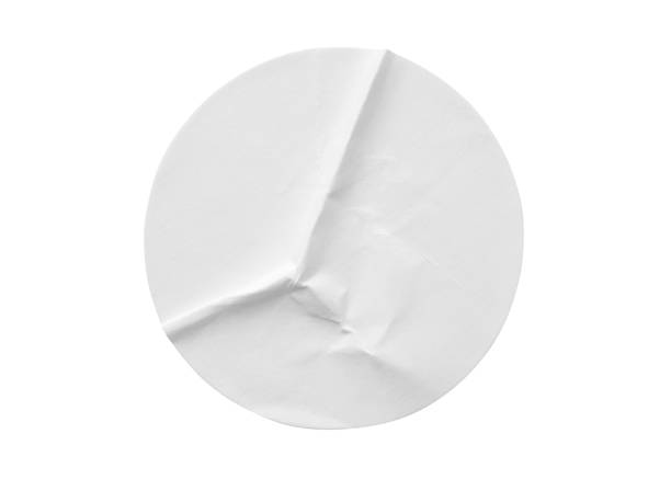 istock Blank white round paper sticker label isolated on white background 1294201534