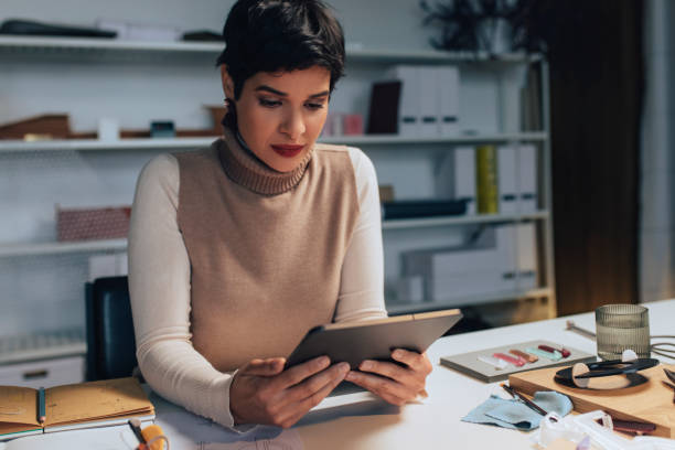 istock Hard-working Jewelry Designer Doing Research for her Project 1294202853