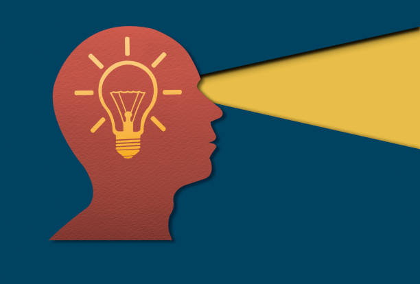 Layered Paper Cut Human Head Shape Within Lightbulb. Paper cut out art creative thinking, concept of innovation idea for cards, posters, flyers, stickers.