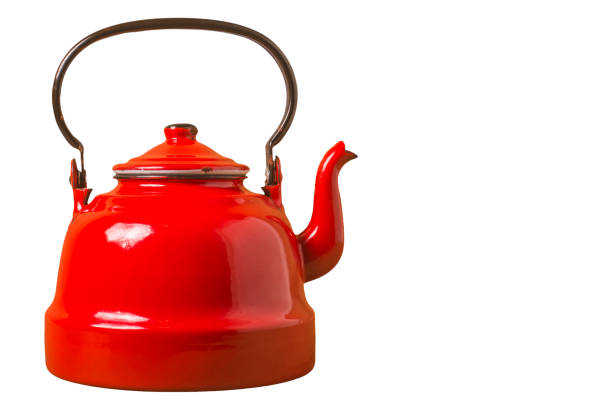 istock Old red porcelain teapot isolated on white background 1294215294
