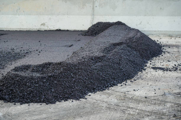 istock The highway construction site is paving the new asphalt pavement. 1294216371