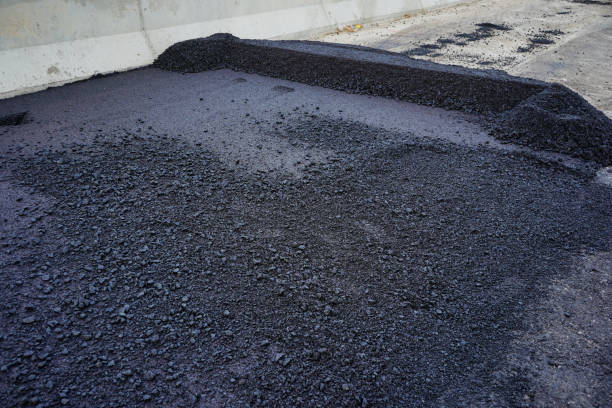 istock The highway construction site is paving the new asphalt pavement. 1294216911