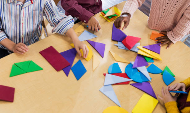 istock Children in school with geometric shapes 1294218131