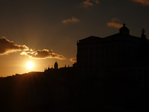 Sunset silhouette view of Porto, Portugal Cathedral.