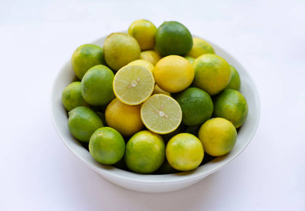 istock Fresh limes isolated on white background. 1294227040