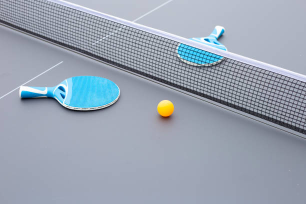 istock Table tennis equipment racket, ball and net 1294227690