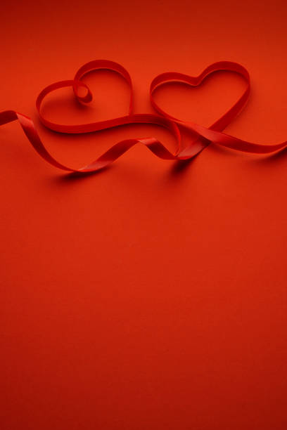 istock Heart Shaped Red Ribbon 1294231542