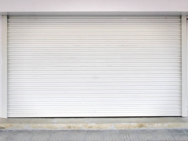 istock Full Frame Background of Closed White Corrugated Shutter Door 1294233694