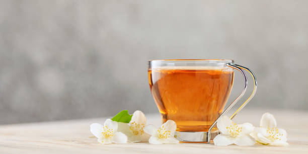 istock Tea with jasmine in a glass cup. Ceremony concept. 1294237178