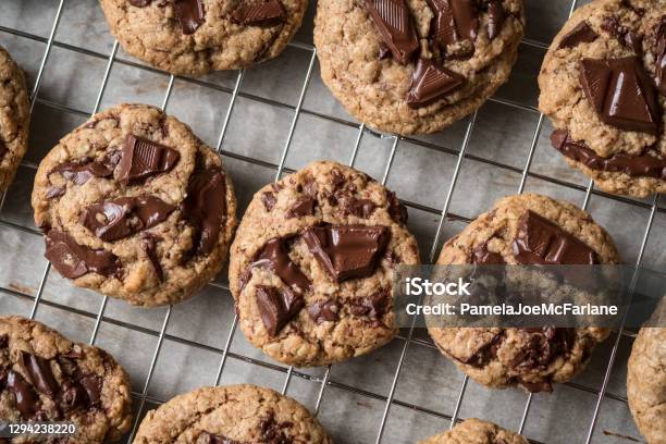 Vegan Homemade Chocolate Chunk Cookies On Cooling Rack Flat Lay Stock Photo - Download Image Now