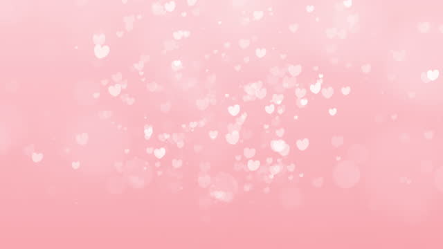 Bewegungsgrafik von rosa Partikel Herz Form der Liebe für Valentinstag Feier Schweben auf Pastell rosa Hintergrund