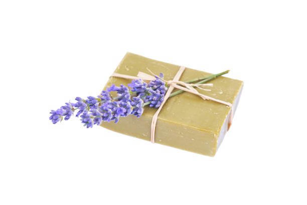 istock Handmade olive soap and lavender flower isolated on white background. 1294241865