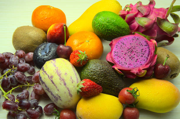 istock Peach, orange, grape, strawberry, mango on table can make fruit platter or salad 1294242127