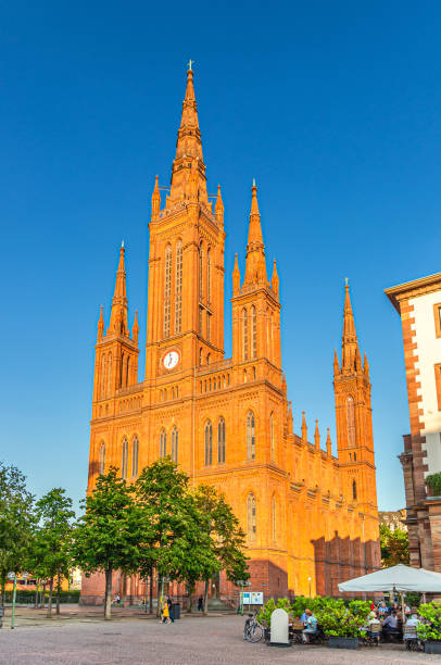 Evangelical Market Protestant church Wiesbaden Wiesbaden, Germany, August 24, 2019: Evangelical Market Protestant church Wiesbaden or Marktkirche neo-Gothic style building on Schlossplatz Palace Square in historical city centre church hessen religion wiesbaden stock pictures, royalty-free photos & images