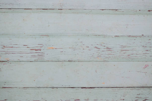 istock Wooden boards. Old peeling paint on a wooden surface. Tree structure. 1294252338