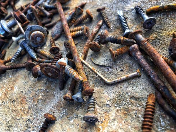 istock used rusty screws and nails on ground 1294252364