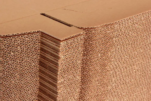 Photo of Cardboard box close-up. Abstract texture background.