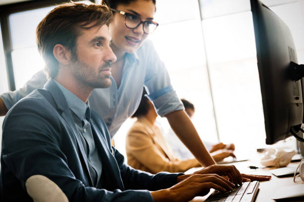 istock Startup business people group of programmer working as team to find solution to problem 1294253507