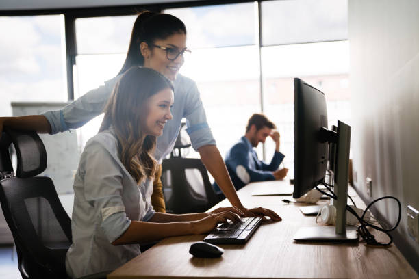 istock Successful happy woman working at office. Technology, computer, startup, business concept. 1294253527