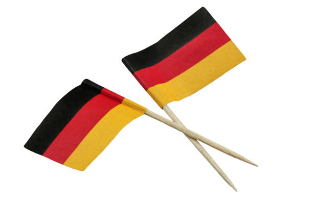 istock Two German paper decoration flags isolated on white background 1294255792
