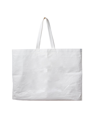 Blank canvas tote bag isolated on white background