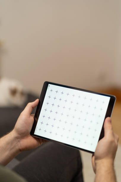 istock Man holding digital tablet pc in his hands at home office 1294257740