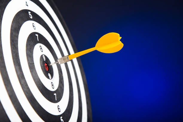 istock Darts arrows in the target center 1294258722