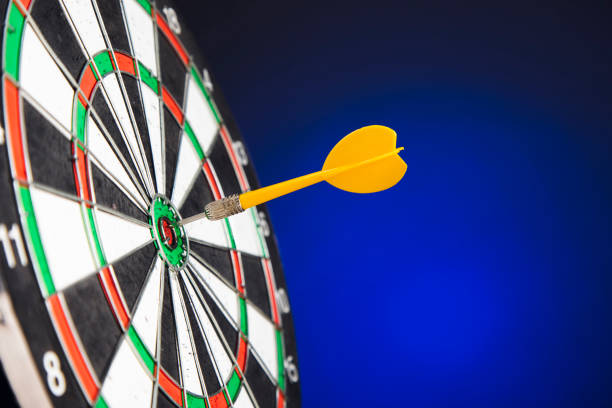 istock Darts arrows in the target center 1294258724
