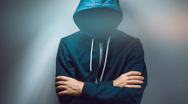 istock the hacker standing arms crossed 1294258734