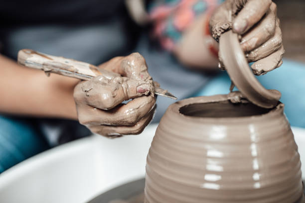 istock Female potter hands close up 1294260972