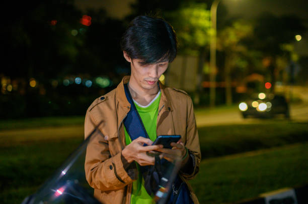 istock Man reading news from a phone with puzzled expressions 1294262914