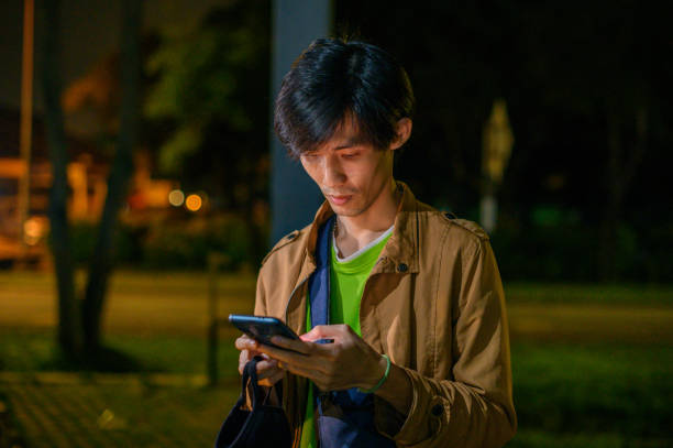 istock Man reading news from a phone with puzzled expressions 1294262931