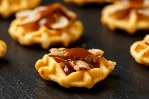 istock Mini waffle duck party food on rustic stone background 1294269641