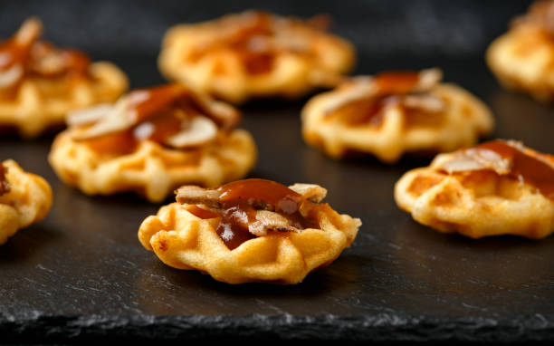 istock Mini waffle duck party food on rustic stone background 1294269679