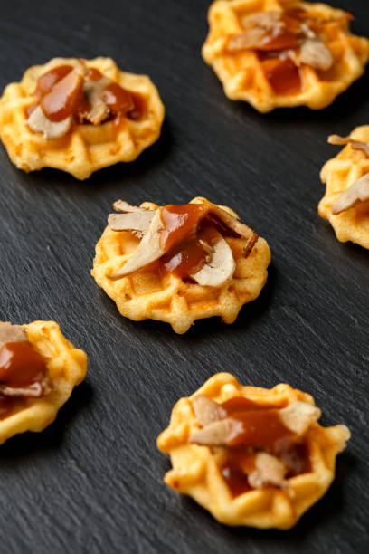 istock Mini waffle duck party food on rustic stone background 1294269738