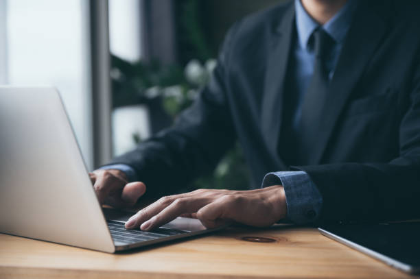 istock businessman person working from home with computer laptop on online cyberspace technology 1294270027