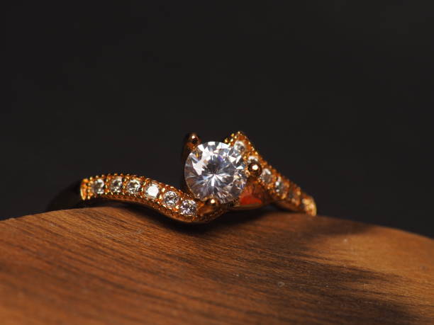 istock Close up Shoot of gold ring with beautiful sparkling diamond beads 1294271237