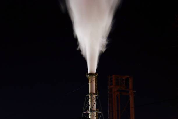 White smoke emitted from oil refineries.