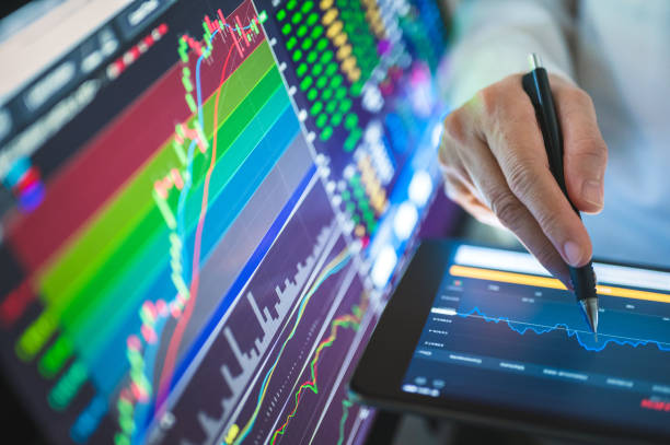 Businesssman using Chart and graph to trading in stock and cryptocurrency after blobal businesss going to bullmarket after Recession