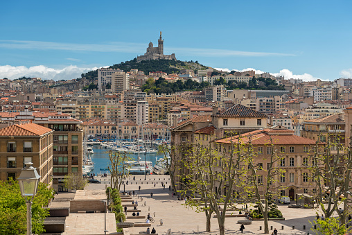 Basilica of Notre-Dame de la Garde from the harbour in Marseille, France, Europe.
