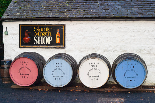 Glengoyne, Great Britain - October 14, 2015: Colourful Whisky casks at Glengoyne distillery in Scotland