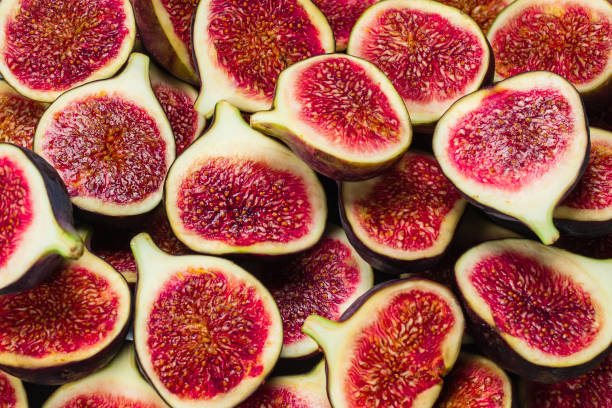 istock Tasty figs background. Top view. 1294283436
