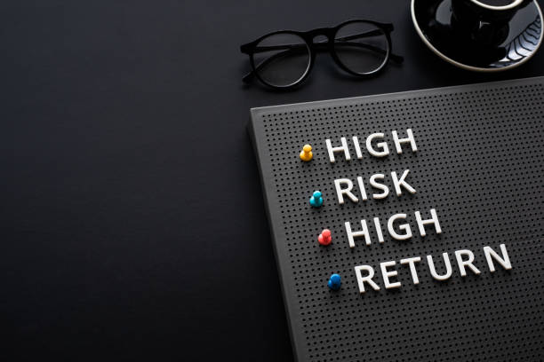 istock High risk high return text on desk.business motivation and growth 1294287239
