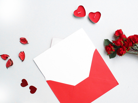 valentines day concept on white background. love letter and red envelope.