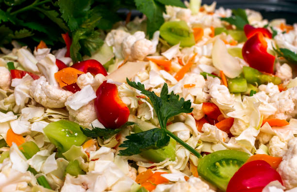 istock Sliced cauliflower, red peppers and green tomatoes 1294291045